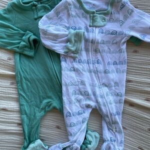 Two Cloud Island Modal footie pajamas. Blue and green rainbows and green solid.